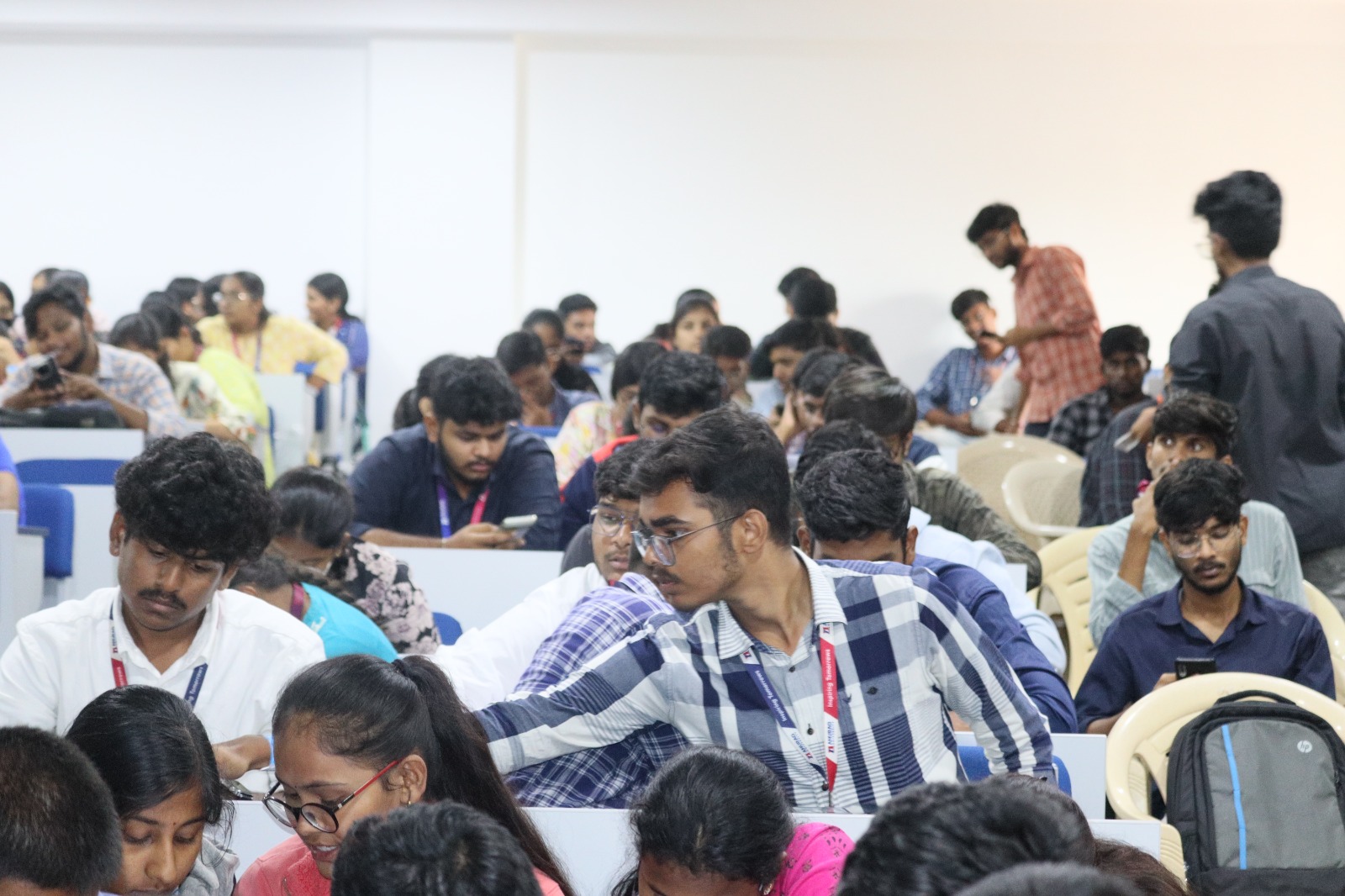 College students seated in a lecture hall during a TechM4India session